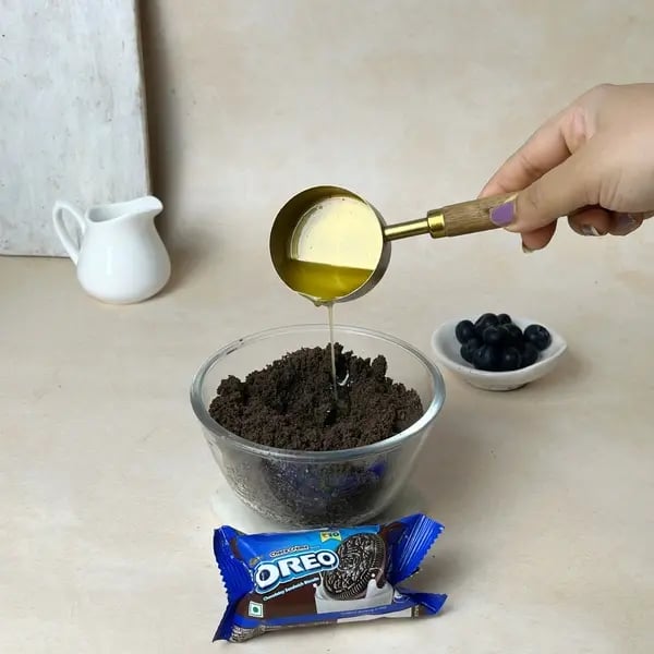 Oreo-Berry Fusion Bites - Stirring Butter Mixture