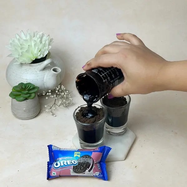 Oreo Bournville Shot - Pouring Chocolate Mixture