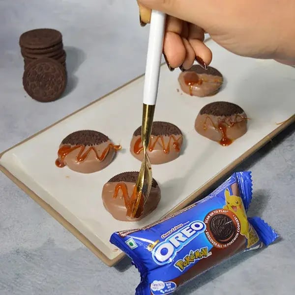 Oreo Caramel Chocolate Dipped - Drizzle caramel sauce