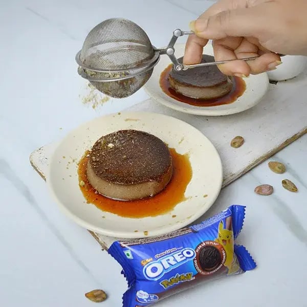Oreo Caramel Pudding with Pistachio Dust - Garnish with some pistachio dust