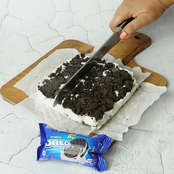 Oreo Ice-cream Sandwich Cake-Add the remaining cookie mixture