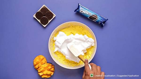 Oreo Mango Cheesecake Recipe - Whipped Cream Folded