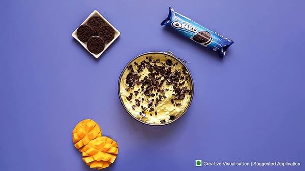 Oreo Mango Cheesecake Recipe - Sprinkling Crushed Oreos