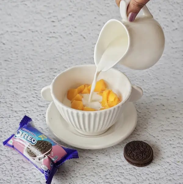 Oreo Mango Milkshake - Add milk to chopped mango pieces
