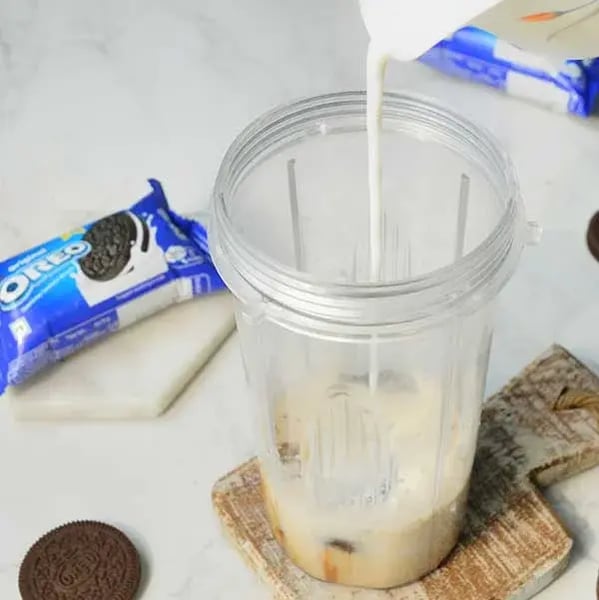 Oreo Milkshake Frappe Recipe - Pouring Chocolate Syrup