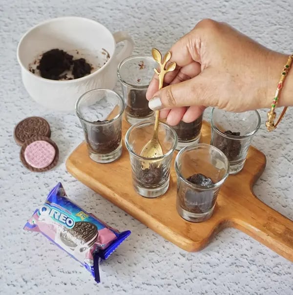 Oreo Pudding Shots - Pour the Oreo crumb mixture
