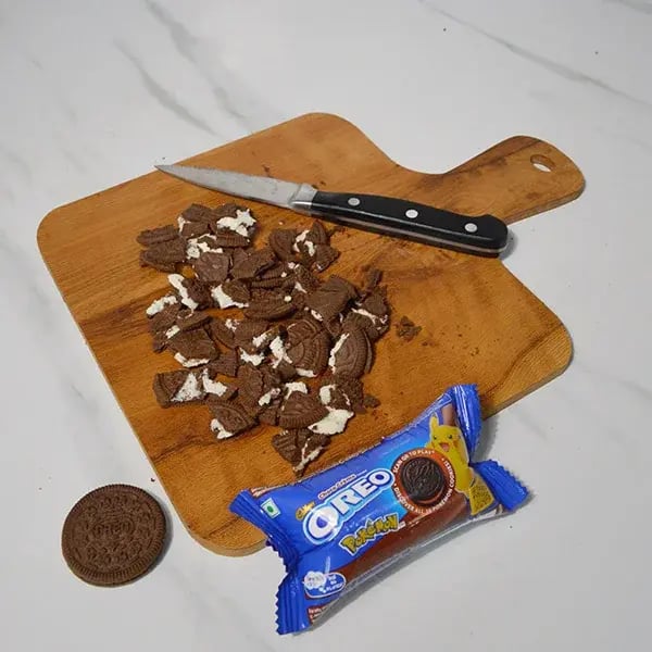 Oreo Rangoli Themed Truffle Cake - Take extra Oreo cookies