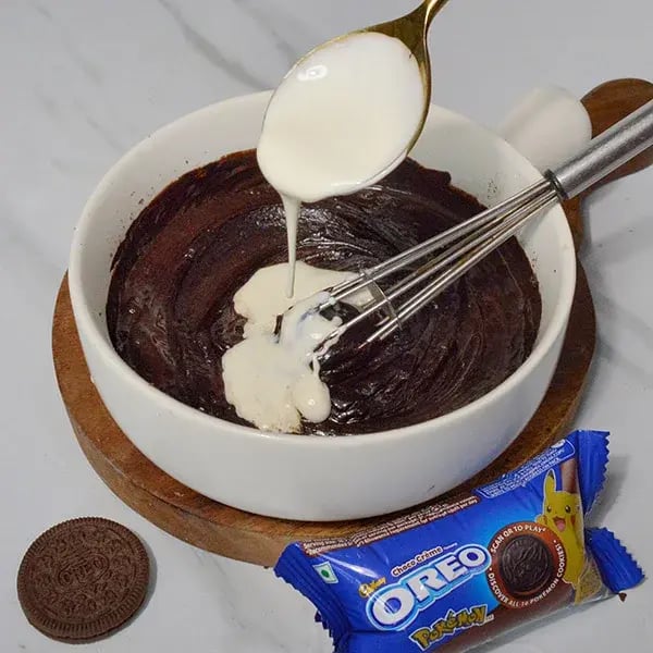 Oreo Rangoli Themed Truffle Cake - Melt dark chocolate