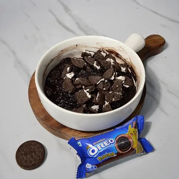 Oreo Rangoli Themed Truffle Cake - Add broken Oreo cookies