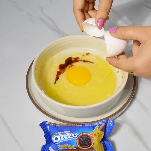 Oreo Stuffed Moist Bundt Cake - Add egg