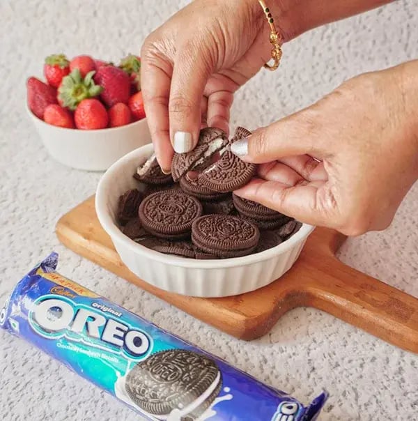 Oreo Truffle Stuffed Strawberries - Add whole Oreo cookies