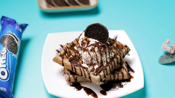 The Best Eggless Oreo Waffle Recipe For Crispy, Fluffy Results - Crushed Oreos Garnish
