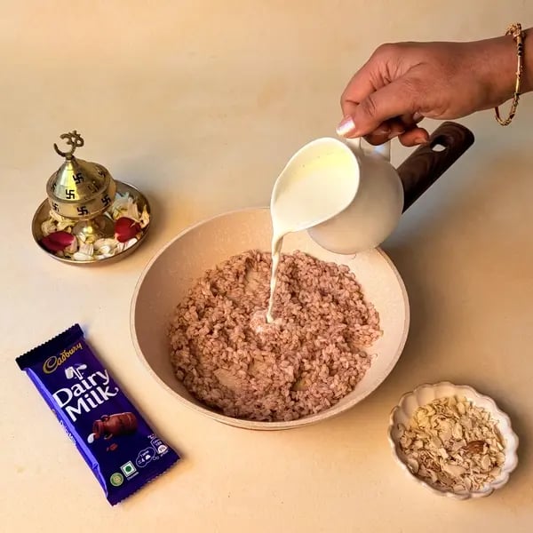 Pal Payasam With Cadbury Dairy Milk Chocolate For Onam - Pouring Milk Into Rice