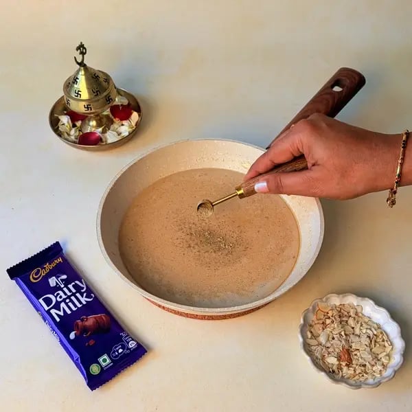 Pal Payasam With Cadbury Dairy Milk Chocolate For Onam - Mixing Cardamom Powder