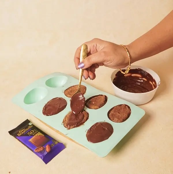 Peanut Butter Chocolate Bon Bon with Bournville-Spoon or pour the remaining melted chocolate