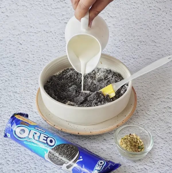 Peda with Oreo and Pistachios-Gradually add milk to form a smooth mixture