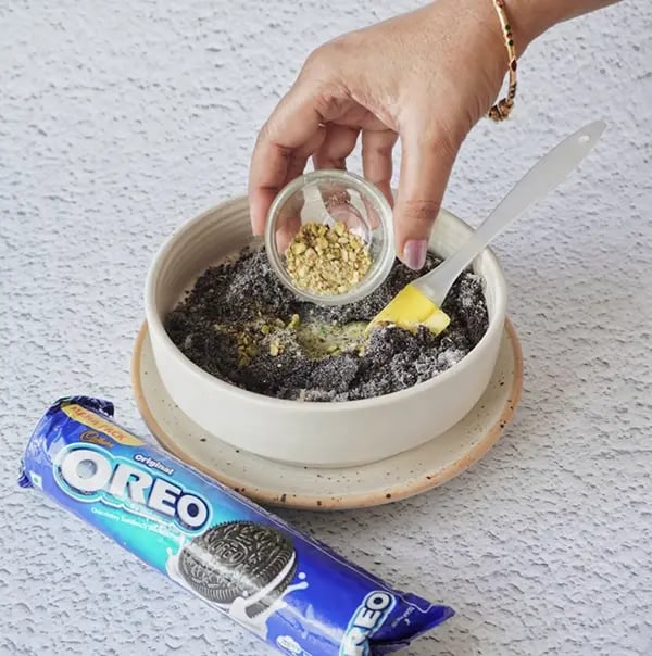 Peda with Oreo and Pistachios-Stir in the chopped pistachios