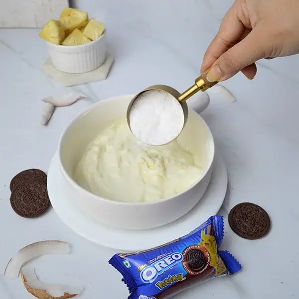 Pina Colada Cheesecake with Oreo Crust - Mix cream cheese