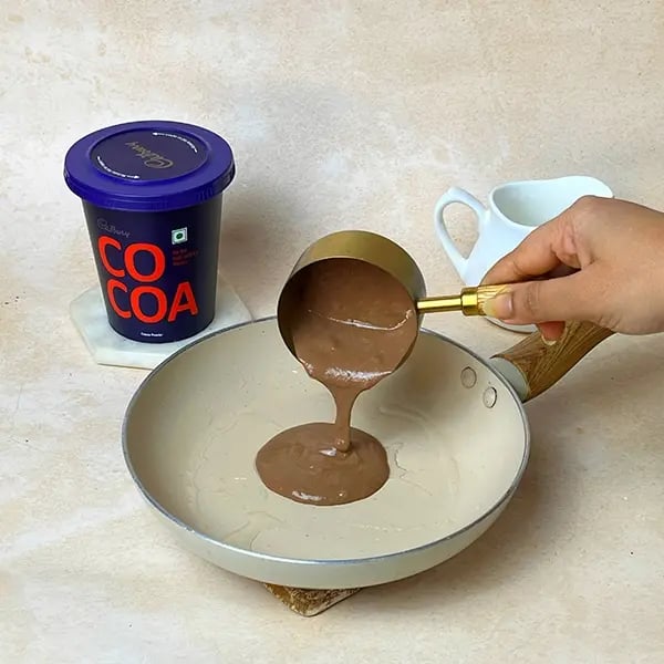 Quick Cocoa Banana Pancake - Grease the pan with oil