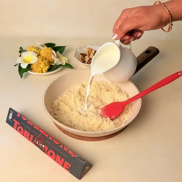 Rawa Kesari With Cadbury Toblerone For Onam - Stirring Rawa Mixture