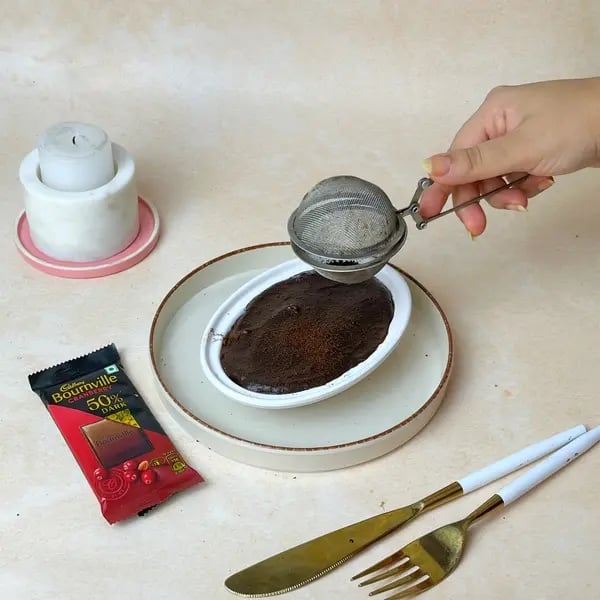 Rice Bournville Pudding - Dusting Cocoa Powder