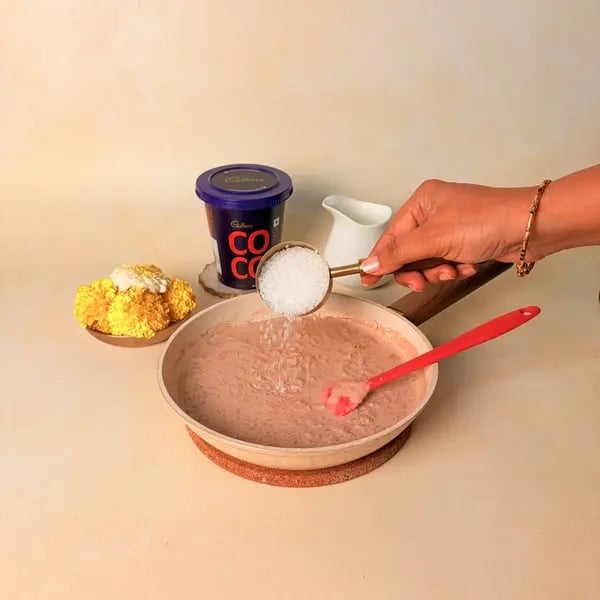 Rice Payasam With Cadbury Cocoa Powder For Onam - Stirring Sugar In Payasam