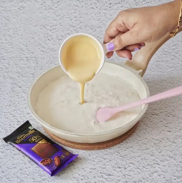 Rose flavored Kulfi with Dry fruit and Bournville Chocolate-In a heavy-bottomed pan