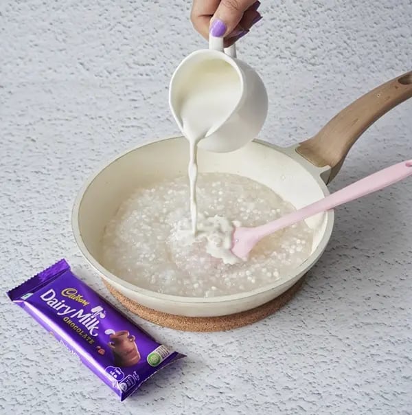 Sabudana Kheer Festive Dessert with Pistachios and Dairy Milk Chocolate Crunch- Add the milk