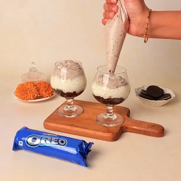 Sabudana Kheer Tiramisu Cups: A Navratri Dessert With An Oreo Twist - Piping Cream Cheese Mixture