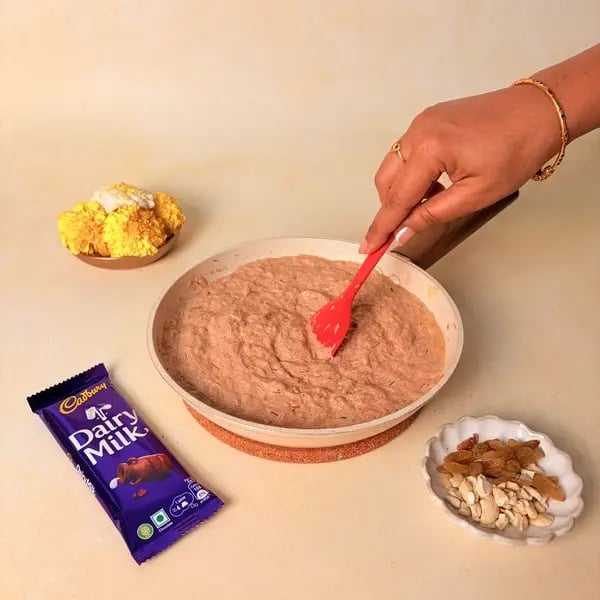 Semiya Payasam With Cadbury Dairy Milk Chocolate For Onam - Stirring Melting Chocolate