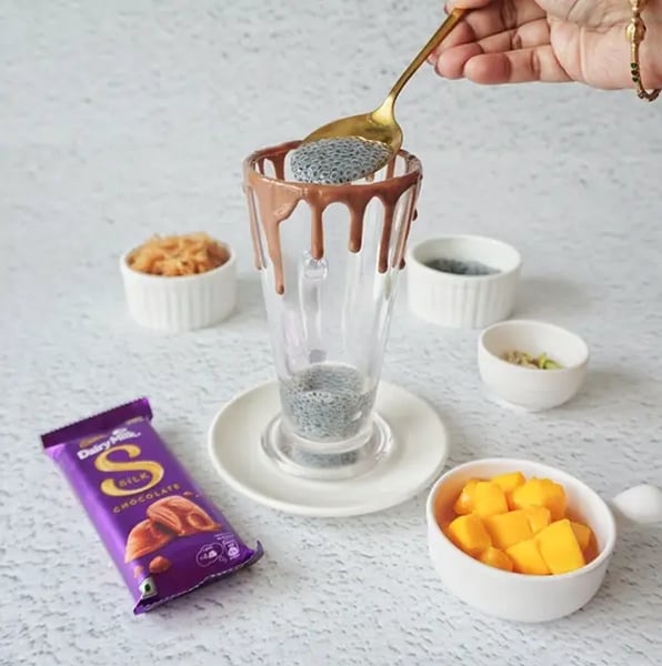 Silk Chocolate Mango Falooda With Sabja Seeds Recipe - Melted Chocolate In Bowl