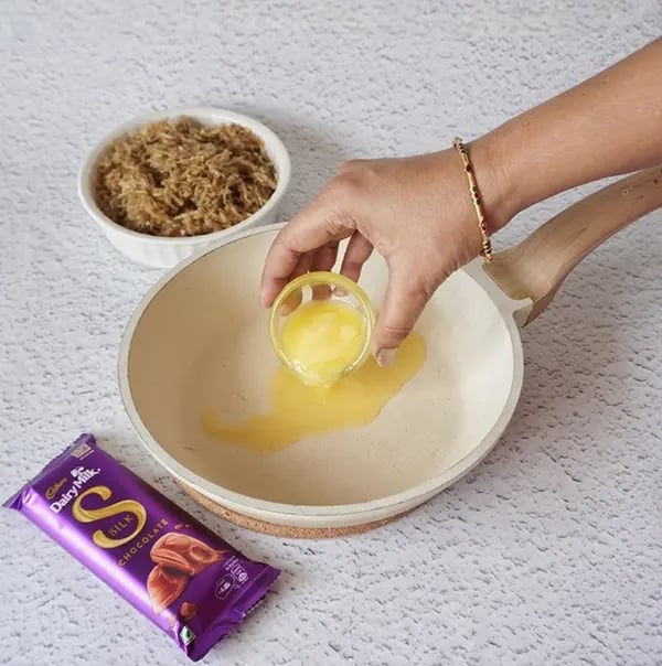 Silky Chocolate Lauki Halwa with Raisins - Heat 1 tablespoon of ghee