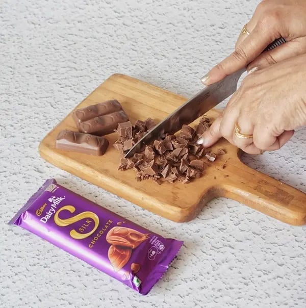 Silky Chocolate Lauki Halwa with Raisins - Chop silk chocolate