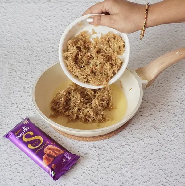 Silky Chocolate Lauki Halwa with Raisins - Add the grated lauki