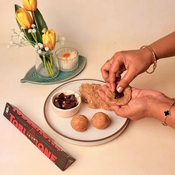 Singhare Ka Halwa Truffles: A Vrat-Friendly Navratri Sweet With A Toblerone Chocolate Center - Enclosing Chocolate In Halwa