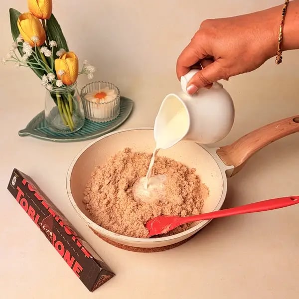 Singhare Ka Halwa Truffles: A Vrat-Friendly Navratri Sweet With A Toblerone Chocolate Center - Stirring Milk Mixture