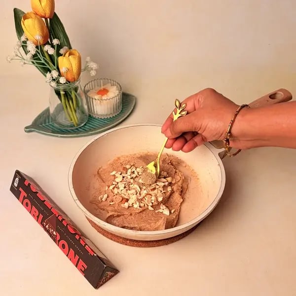 Singhare Ka Halwa Truffles: A Vrat-Friendly Navratri Sweet With A Toblerone Chocolate Center - Sprinkling Cardamom Powder