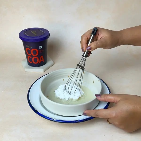 Softest Eggless Cocoa Mango Cake - Whisking Sugar And Oil