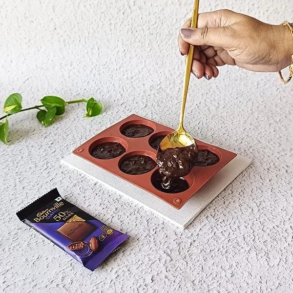 Strawberry Chocolate Bites - Pour the mixture into truffle mold