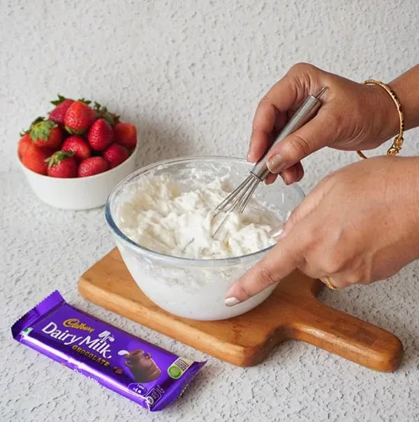 Strawberry Icebox Cake with Almonds and Dairy Milk - Beat the heavy whipping cream