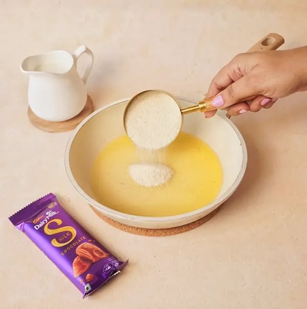 Suji Ka Halwa with Cadbury Dairy Milk Silk-Add suji and roast it