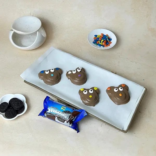 Teddy Bear Chocolate Covered Oreo - Attach edible candy eyes