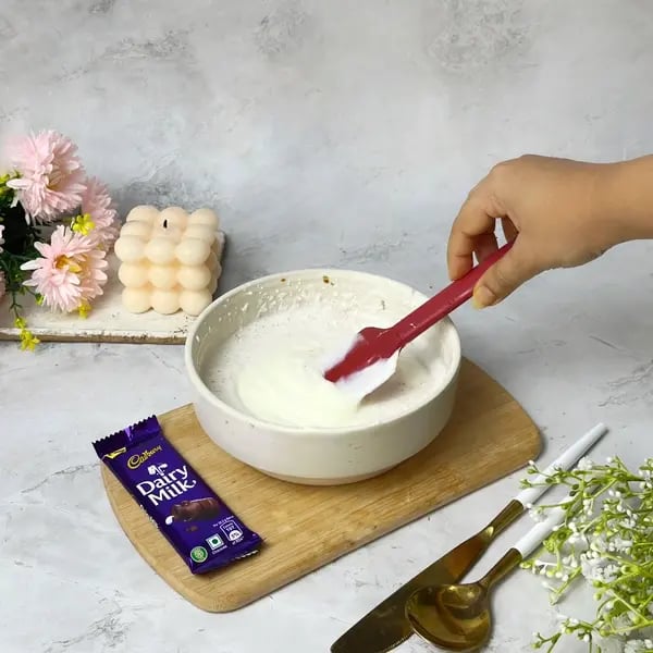 The Ultimate Vanilla Cinnamon Dairymilk Cheesecake - Folding Cream Cheese Mixture