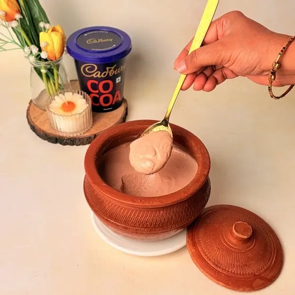Traditional Bengali Mishti Doi Recipe With A Chocolatey Twist For Dussehra - Dusting Cocoa Powder
