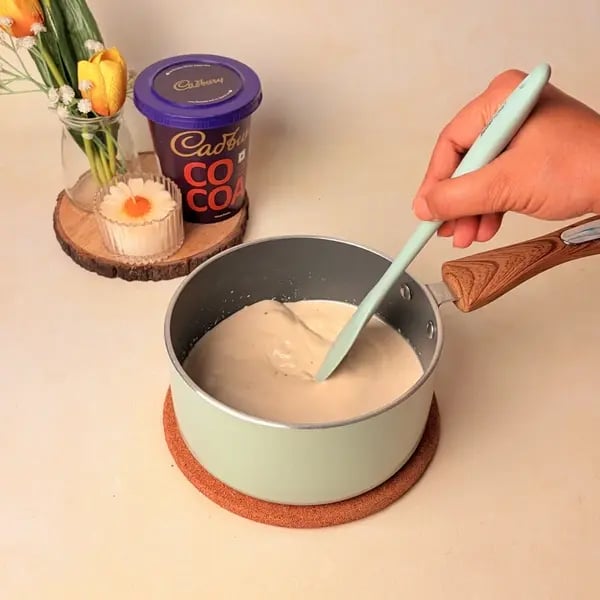Traditional Bengali Mishti Doi Recipe With A Chocolatey Twist For Dussehra - Stirring Milk Sugar