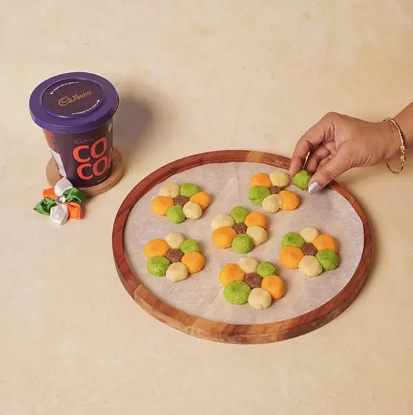 Tricolor Chocolate Flower Sondesh with Mawa and Pistachio for INDEPENDENCE DAY - Place one chocolate ball in the center of the tray