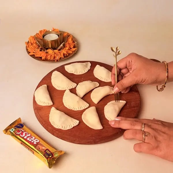 Try This Diwali Special Baked Gujiya Recipe With Cadbury 5 Star For Your Loved Ones - Crimping Gujiya Edges
