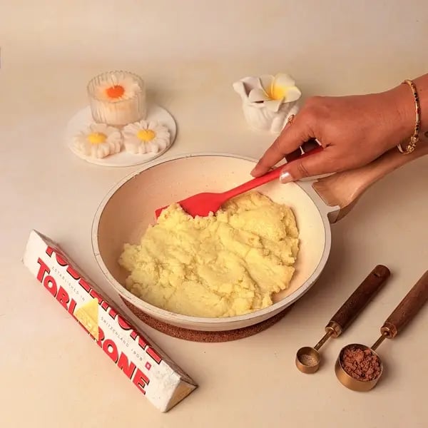 Try This Festive Special Chocolate Kesar Peda Recipe With A Toblerone Twist - Stirring Dough Mixture