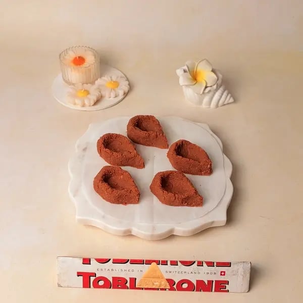 Try This Festive Special Chocolate Kesar Peda Recipe With A Toblerone Twist - Shaped Chocolate Pedas