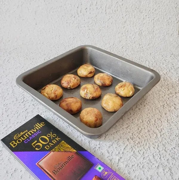Vanilla Chocolate Cookies with Cashews & Raisins - Drop rounded tablespoons of the batter